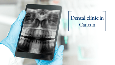 Dentist holding a tablet with a teeth radiograph